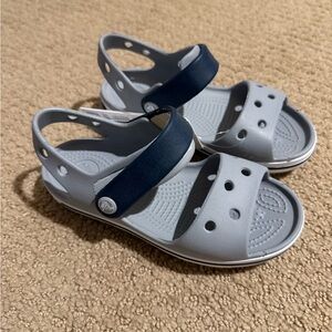 New. Crocs sandals. Size C11.